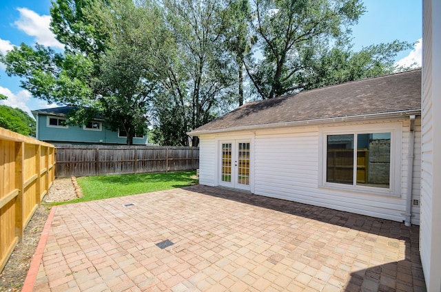 view of patio / terrace with french doors and a fenced backyard