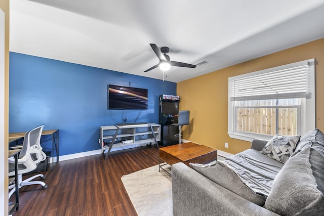 1609 Tabor St, Houston, TX 77009 - living room featuring baseboards, ceiling fan, wood finished floors, and visible vents