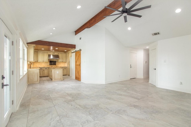 unfurnished living room featuring marble finish floor, beam ceiling, ceiling fan, recessed lighting, and a sink