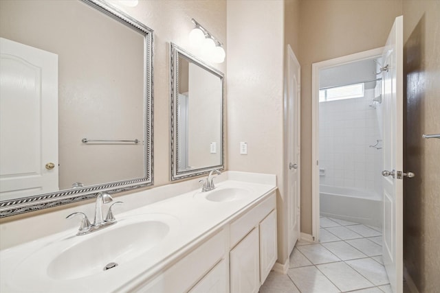 bathroom featuring a sink, tile patterned floors, shower / bathing tub combination, and double vanity