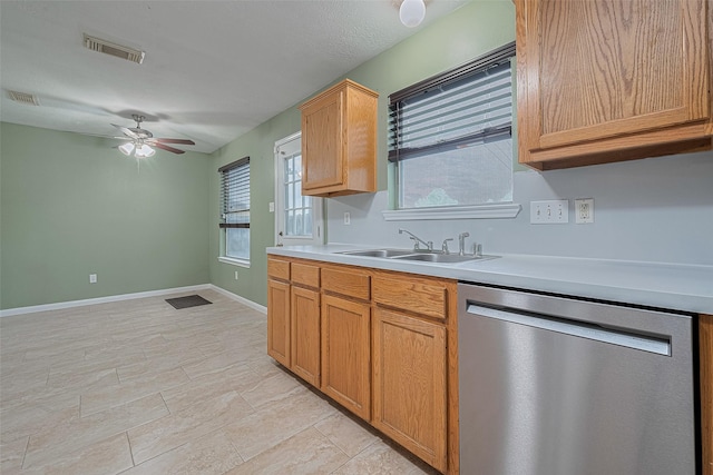 10834 Glenora Dr, Houston, TX 77065 - kitchen featuring stainless steel dishwasher, light countertops, and ceiling fan