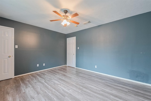 10834 Glenora Dr, Houston, TX 77065 - spare room with wood finished floors and a ceiling fan