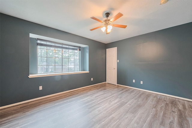 10834 Glenora Dr, Houston, TX 77065 - unfurnished room with wood finished floors and ceiling fan