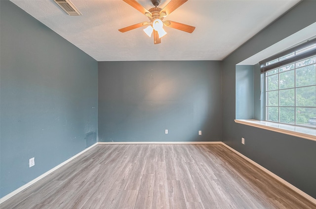 10834 Glenora Dr, Houston, TX 77065 - spare room with wood finished floors and ceiling fan