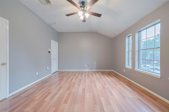 10834 Glenora Dr, Houston, TX 77065 - spare room with ceiling fan, lofted ceiling, and light wood-style floors