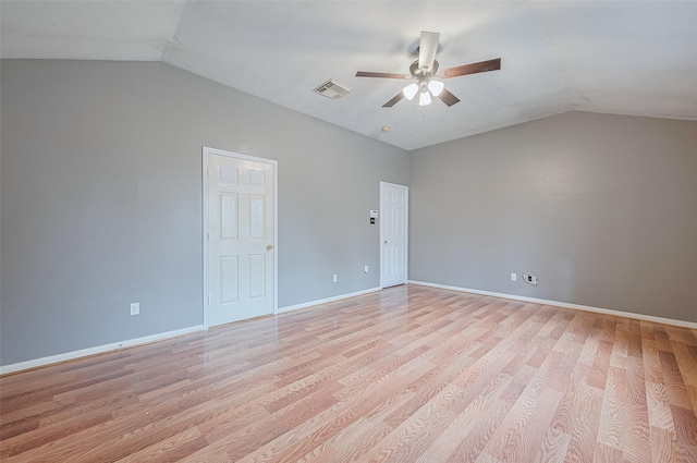 10834 Glenora Dr, Houston, TX 77065 - spare room featuring vaulted ceiling, ceiling fan, and light wood-style floors