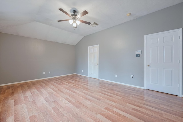 10834 Glenora Dr, Houston, TX 77065 - unfurnished room featuring ceiling fan, light wood-style floors, lofted ceiling, and a smoke detector