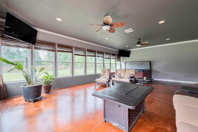living area featuring visible vents, a ceiling fan, concrete flooring, and recessed lighting