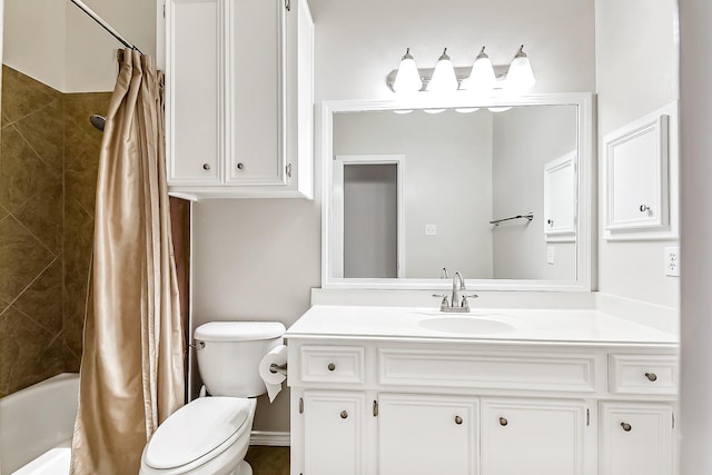 bathroom with vanity, shower / bath combo, and toilet