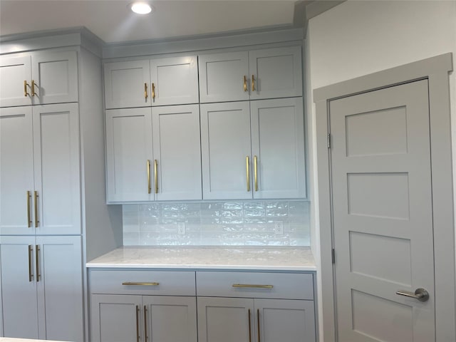 interior space featuring tasteful backsplash