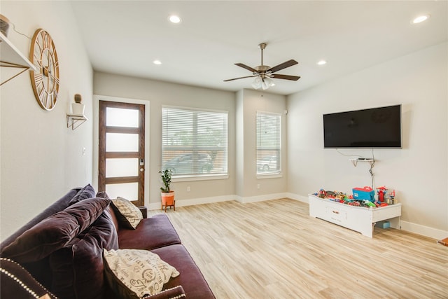 7709 Rainbow Close Ln, Houston, TX 77055 - living area featuring a ceiling fan, baseboards, recessed lighting, and wood finished floors
