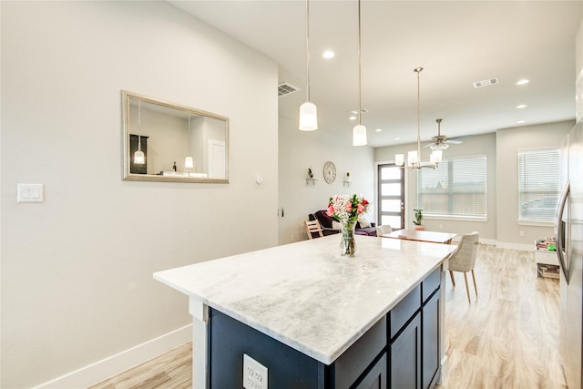 7709 Rainbow Close Ln, Houston, TX 77055 - kitchen featuring a kitchen island, visible vents, baseboards, light wood-style floors, and recessed lighting