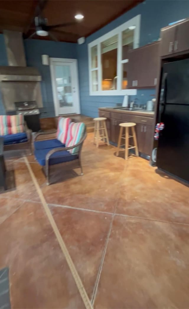 view of patio featuring a ceiling fan