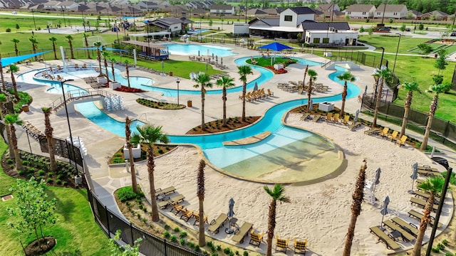 view of pool with a residential view