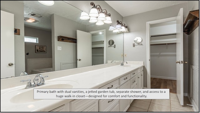 6627 Gleneagles Dr, Pasadena, TX 77505 - full bathroom with a walk in closet, a sink, double vanity, tile patterned floors, and visible vents