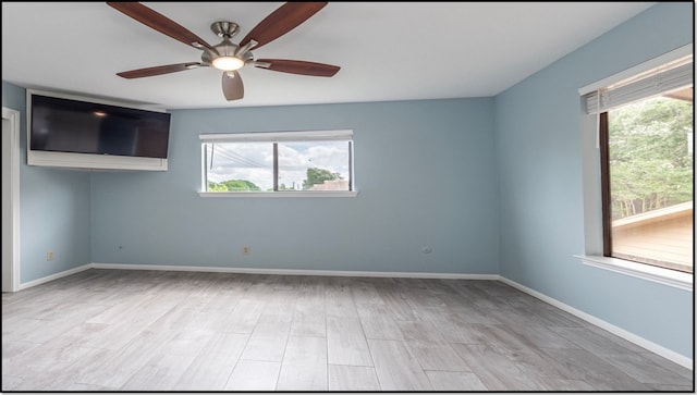 6627 Gleneagles Dr, Pasadena, TX 77505 - unfurnished room with baseboards, ceiling fan, and light wood-style flooring