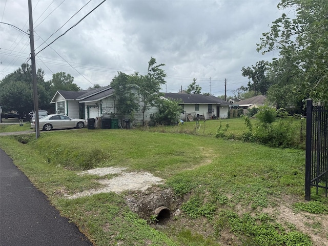 view of yard featuring fence