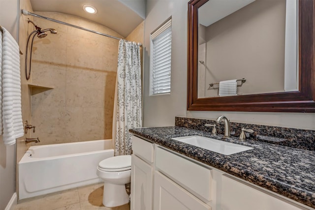 bathroom featuring vanity, toilet, tile patterned floors, and shower / tub combo