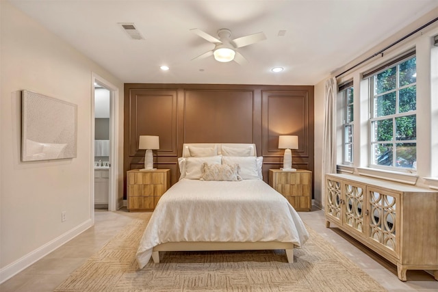bedroom featuring visible vents, recessed lighting, baseboards, and ensuite bathroom