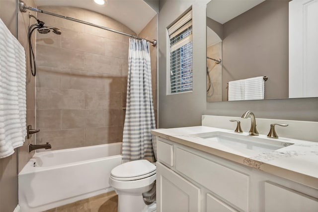 full bath featuring vanity, toilet, and shower / tub combo