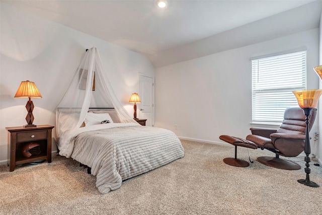 6006 Henry Hamlet Dr, Conroe, TX 77304 - carpeted bedroom featuring lofted ceiling and baseboards