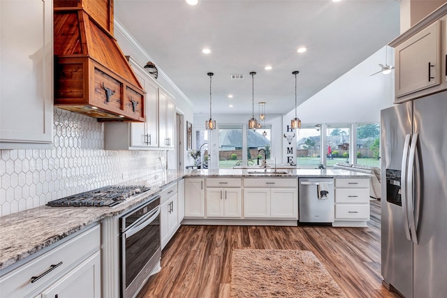 6006 Henry Hamlet Dr, Conroe, TX 77304 - kitchen with stainless steel appliances, a sink, tasteful backsplash, recessed lighting, and dark wood-style flooring