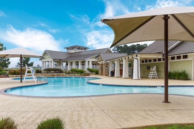 6006 Henry Hamlet Dr, Conroe, TX 77304 - community pool featuring a patio