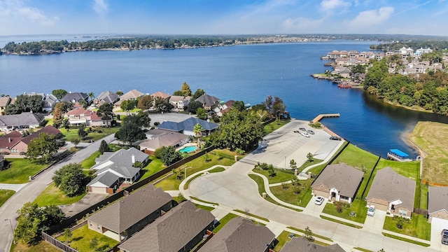 6006 Henry Hamlet Dr, Conroe, TX 77304 - aerial view of residential area featuring a nearby body of water