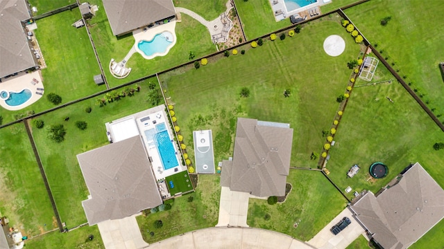 6006 Henry Hamlet Dr, Conroe, TX 77304 - drone / aerial view of a pool area
