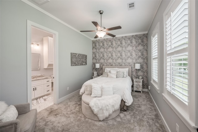 15062 Lake Paula Dr, Willis, TX 77318 - bedroom with baseboards, an accent wall, multiple windows, and visible vents