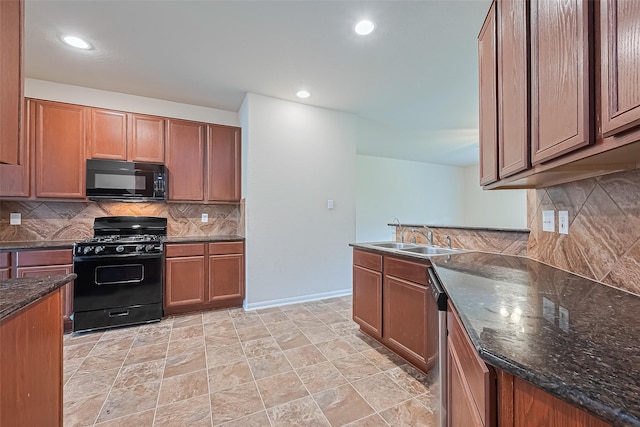 kitchen featuring recessed lighting, brown cabinets, a sink, backsplash, and black appliances
