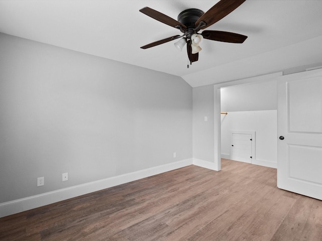 14800 Tallow St, Santa Fe, TX 77517 - spare room with baseboards, a ceiling fan, lofted ceiling, and wood finished floors