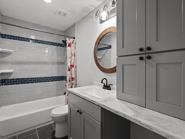 14800 Tallow St, Santa Fe, TX 77517 - full bath featuring visible vents, tile patterned flooring, vanity, shower / bath combination with curtain, and toilet