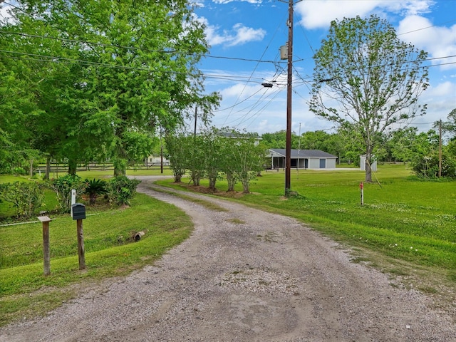 14800 Tallow St, Santa Fe, TX 77517 - view of street featuring gravel driveway