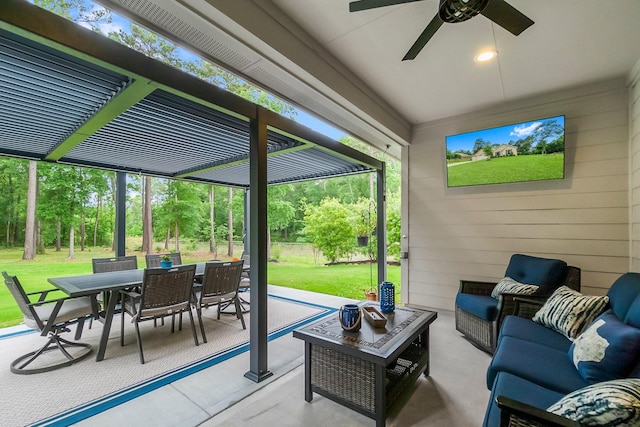 sunroom / solarium with an outdoor living space, outdoor dining area, and a ceiling fan