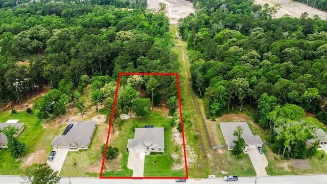aerial view with a wooded view