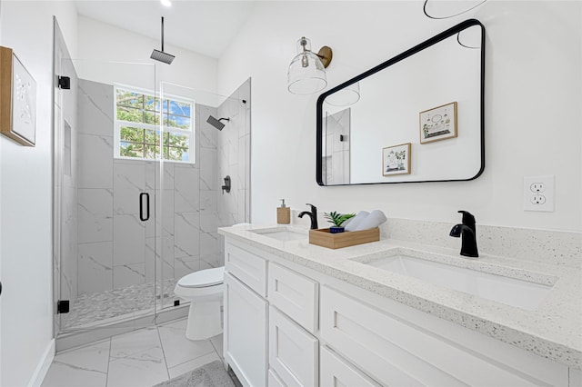 full bathroom featuring a sink, marble finish floor, a marble finish shower, and toilet