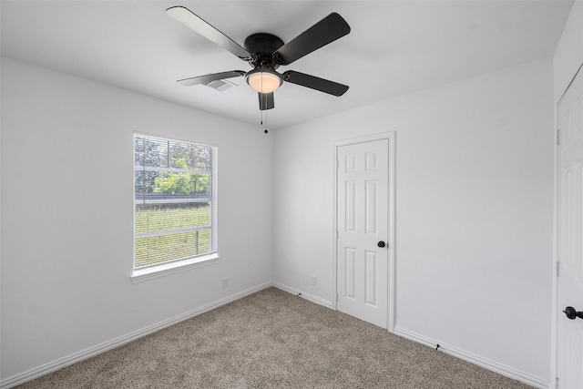 7817 Woodlyn Rd, Houston, TX 77028 - unfurnished bedroom featuring carpet, baseboards, and ceiling fan