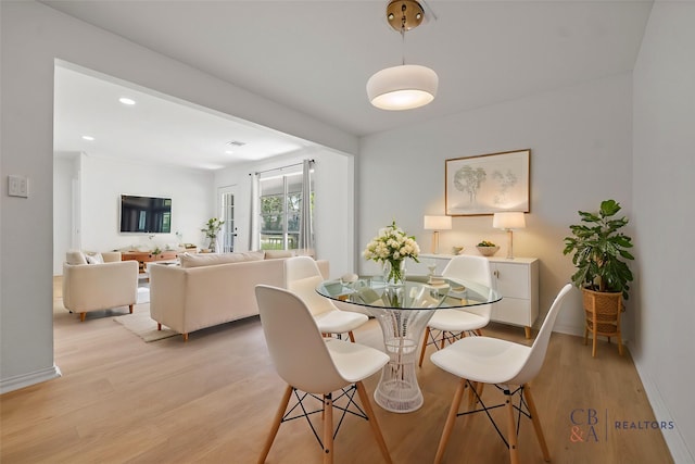 7817 Woodlyn Rd, Houston, TX 77028 - dining room featuring light wood-type flooring, baseboards, and recessed lighting