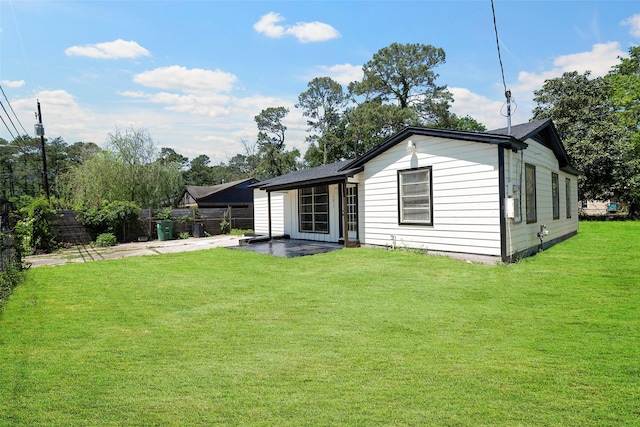 7817 Woodlyn Rd, Houston, TX 77028 - rear view of property featuring a patio area