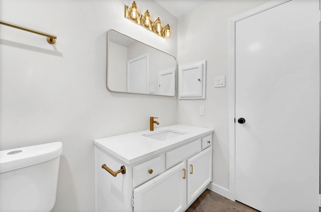 half bath with toilet and vanity