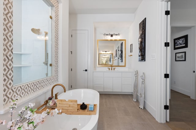 208 S Empress Green Pl, Montgomery, TX 77316 - bathroom featuring vanity and a bathtub
