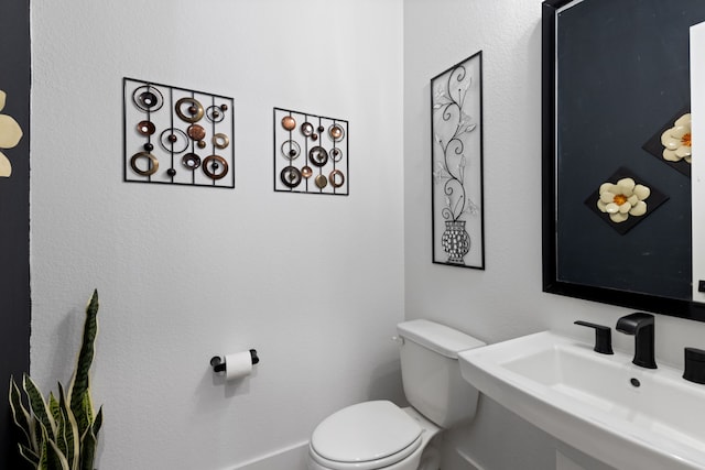 208 S Empress Green Pl, Montgomery, TX 77316 - half bath featuring a sink and toilet
