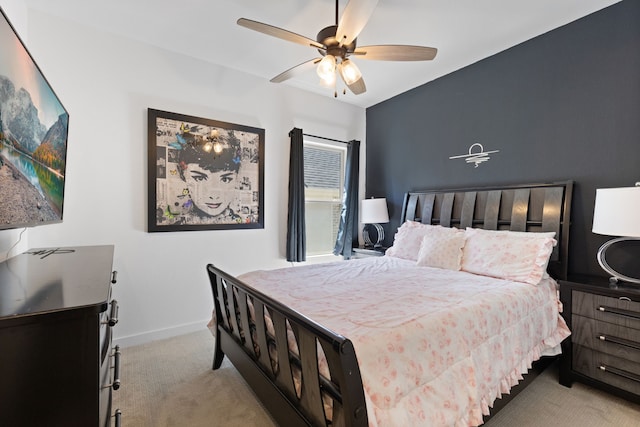 208 S Empress Green Pl, Montgomery, TX 77316 - bedroom with carpet floors, a ceiling fan, and baseboards
