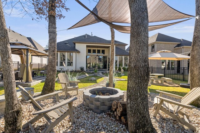 208 S Empress Green Pl, Montgomery, TX 77316 - exterior space featuring fence, a patio, a gazebo, and an outdoor fire pit