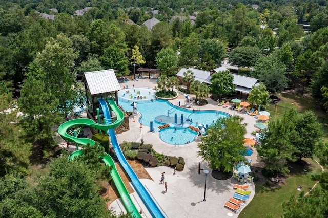 208 S Empress Green Pl, Montgomery, TX 77316 - birds eye view of property featuring a forest view