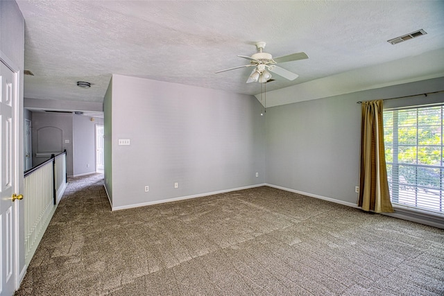6505 River Glen Ct, Pearland, TX 77584 - unfurnished room featuring a ceiling fan, carpet, and a textured ceiling