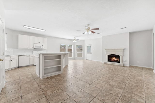 kitchen with a ceiling fan, visible vents, open shelves, white appliances, and light tile patterned flooring