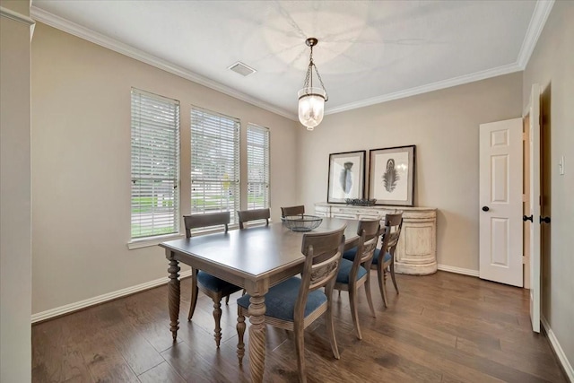 13538 Scenic Glade Dr, Houston, TX 77059 - dining space with ornamental molding, baseboards, and dark wood-type flooring