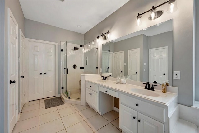 13538 Scenic Glade Dr, Houston, TX 77059 - bathroom with tile patterned floors, a shower stall, and double vanity